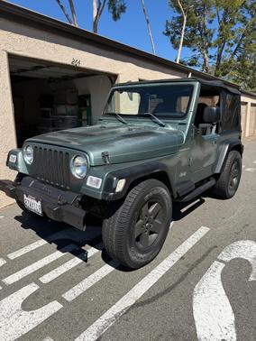 Green 1999 Jeep Wrangler SE