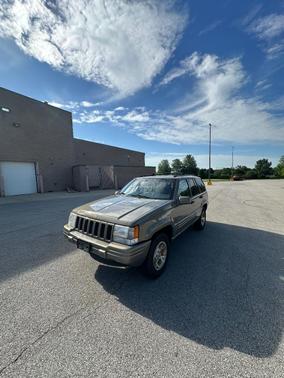 Gold 1998 Jeep Grand Cherokee Limited 4WD