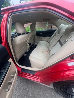 Red 2014 Toyota Camry LE