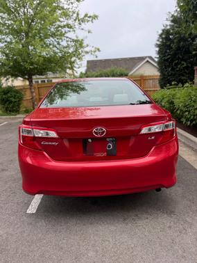 Red 2014 Toyota Camry LE