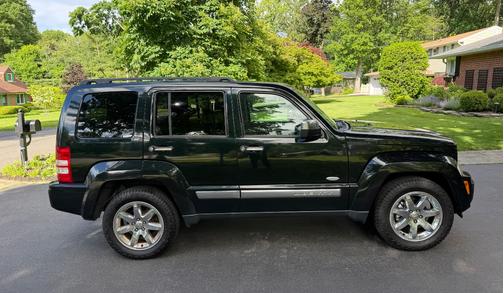 Black 2012 Jeep Liberty Sport
