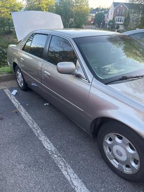 Gold 2002 Cadillac DeVille Base