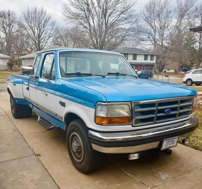 Blue 1992 Ford F-250 Custom SuperCab H/D