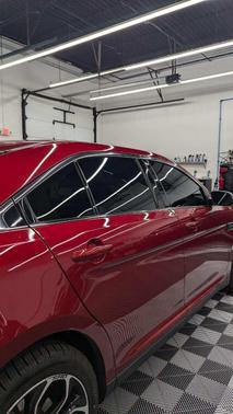 Red 2015 Ford Taurus SHO