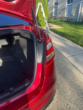 Red 2015 Ford Taurus SHO