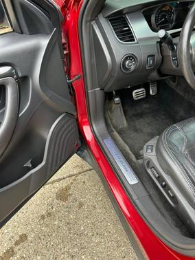 Red 2015 Ford Taurus SHO