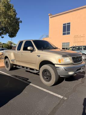 Gold 2000 Ford F-150 Lariat SuperCab Flareside