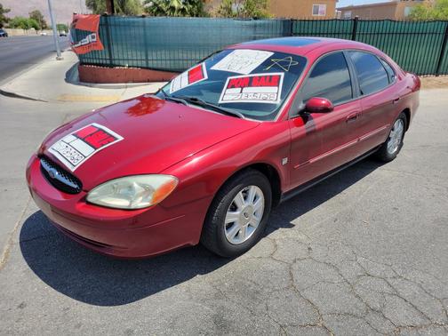 Red 2003 Ford Taurus SEL