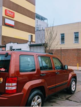 Red 2009 Jeep Liberty Sport