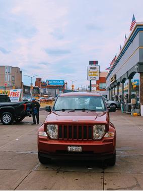 Red 2009 Jeep Liberty Sport