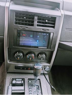 Red 2009 Jeep Liberty Sport