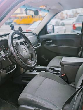Red 2009 Jeep Liberty Sport