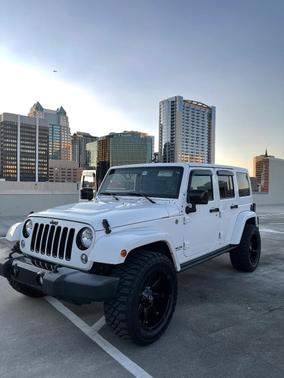 White 2015 Jeep Wrangler Unlimited Altitude