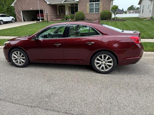 Red 2015 Chevrolet Malibu 1LZ