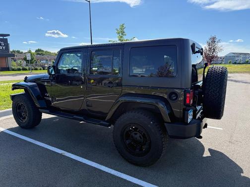 Black 2016 Jeep Wrangler Unlimited Sahara