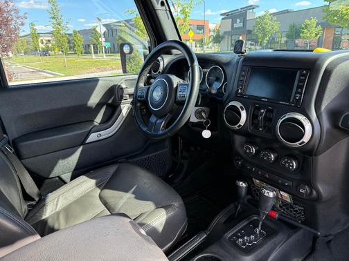 Black 2016 Jeep Wrangler Unlimited Sahara