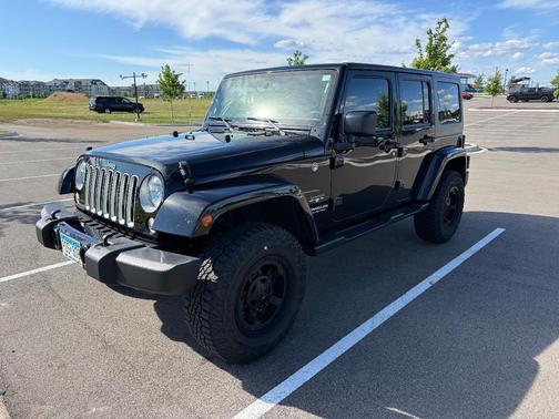Black 2016 Jeep Wrangler Unlimited Sahara