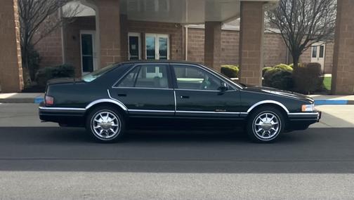 Green 1997 Cadillac Seville SLS
