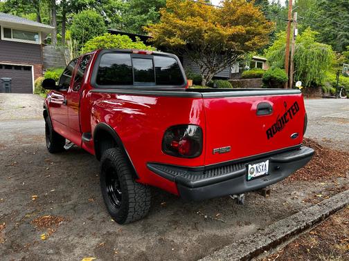 Red 2002 Ford F-150 XLT SuperCab Flareside