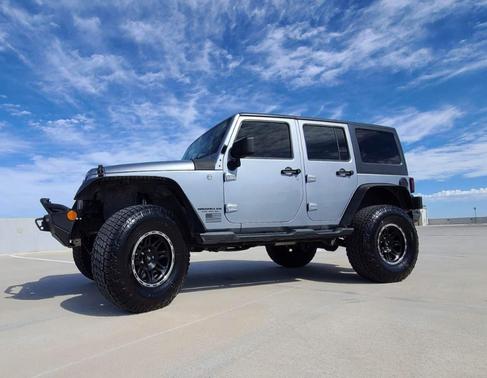 Photo 1 of 18 of 2013 Jeep Wrangler Unlimited Sport