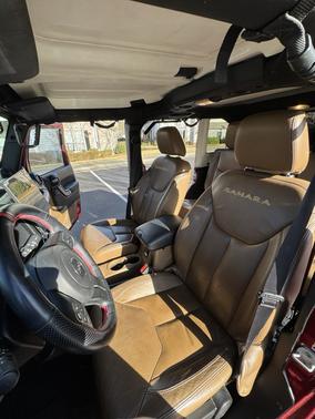 Red 2013 Jeep Wrangler Unlimited Sahara