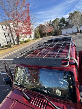 Red 2013 Jeep Wrangler Unlimited Sahara