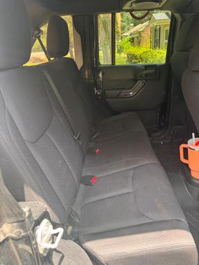 Black 2014 Jeep Wrangler Unlimited Sport