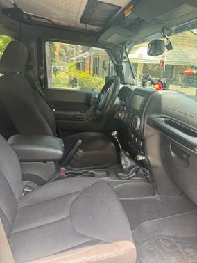 Black 2014 Jeep Wrangler Unlimited Sport