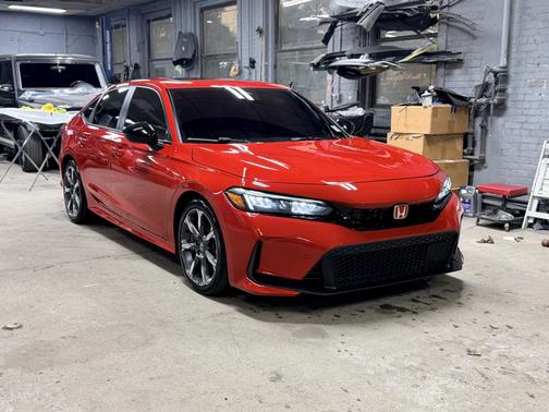 Red 2025 Honda Civic Hybrid Sport Touring