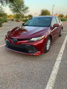 Red 2018 Toyota Camry Hybrid LE