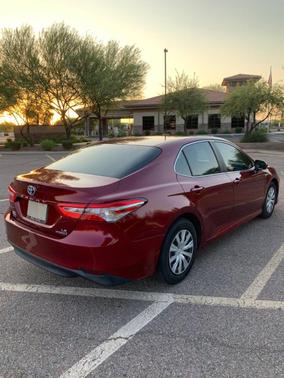 Red 2018 Toyota Camry Hybrid LE