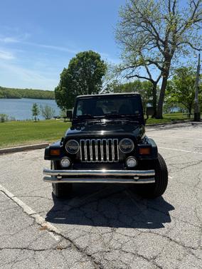 Black 1998 Jeep Wrangler Sport