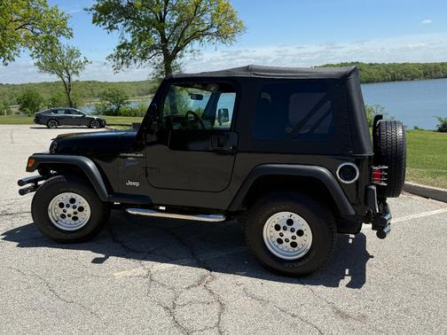 Black 1998 Jeep Wrangler Sport