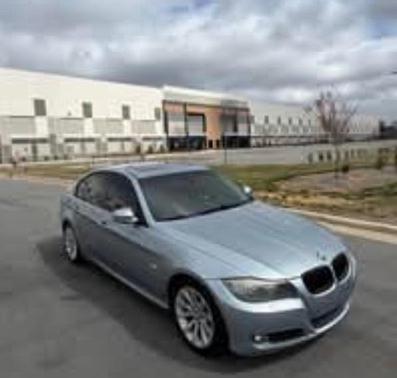 Blue 2009 BMW 328 i