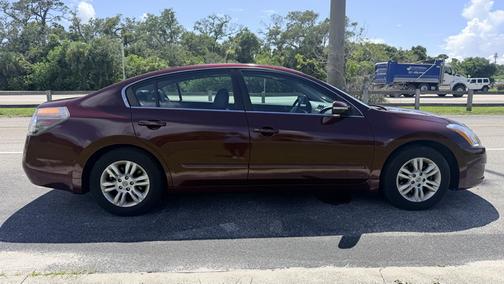 Red 2010 Nissan Altima 2.5 SL