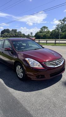 Red 2010 Nissan Altima 2.5 SL