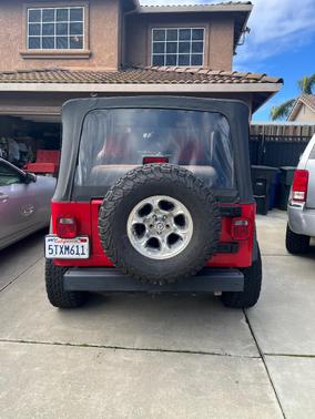 Red 2006 Jeep Wrangler SE