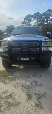 Red 2015 Ford F-250 Platinum