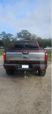 Red 2015 Ford F-250 Platinum