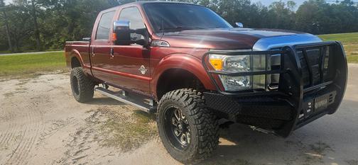 Red 2015 Ford F-250 Platinum