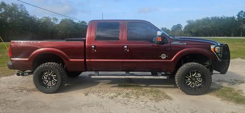 Red 2015 Ford F-250 Platinum