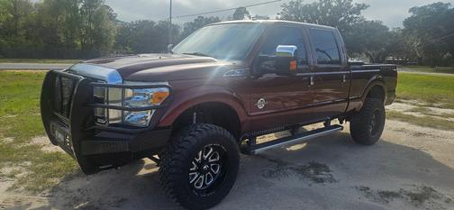 Red 2015 Ford F-250 Platinum