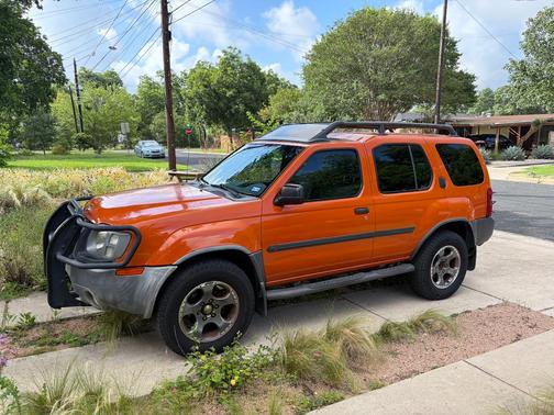 Orange 2003 Nissan Xterra SE S/C
