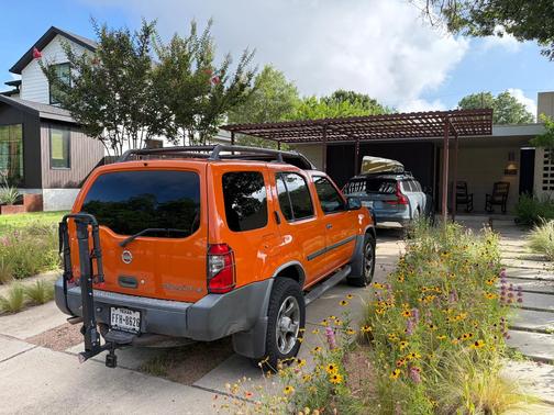 Orange 2003 Nissan Xterra SE S/C