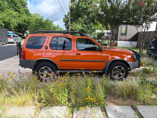 Orange 2003 Nissan Xterra SE S/C