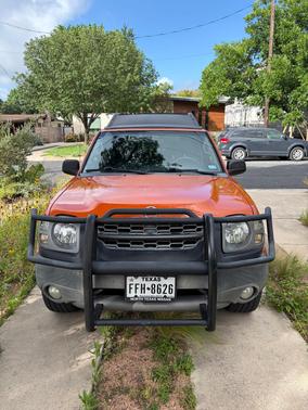 Orange 2003 Nissan Xterra SE S/C