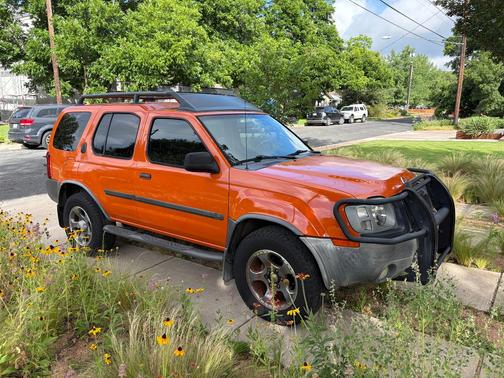Orange 2003 Nissan Xterra SE S/C