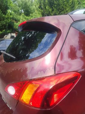Red 2009 Nissan Murano LE