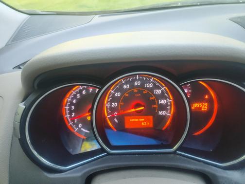 Red 2009 Nissan Murano LE