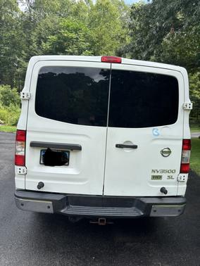 White 2015 Nissan NV Passenger NV3500 HD SL V8